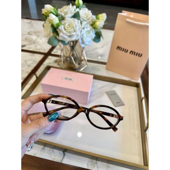 Miu Miu Tortoiseshell Round Optical Glasses